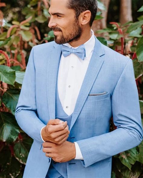 groom light blue wedding suit.